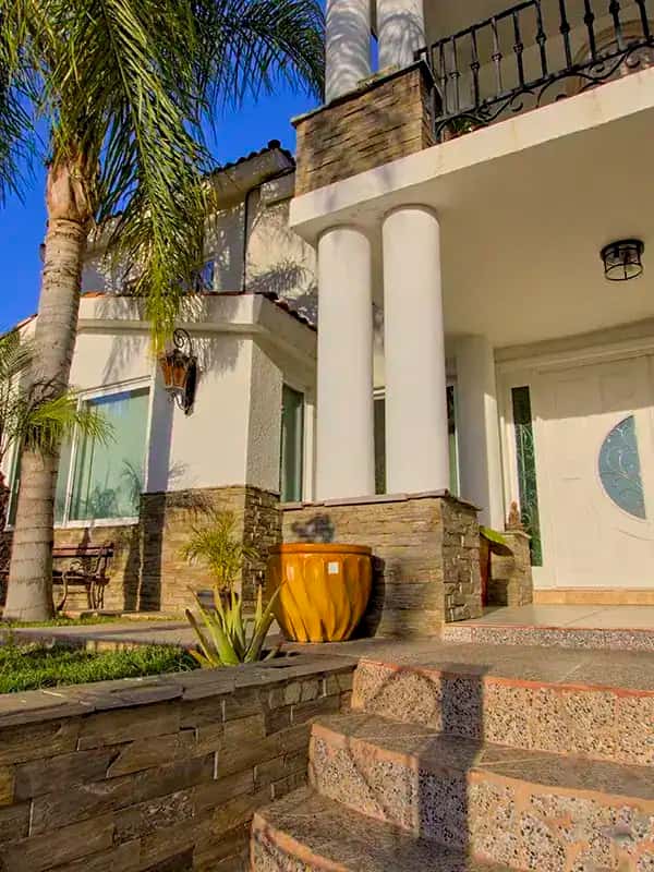 twilight house palm tree front