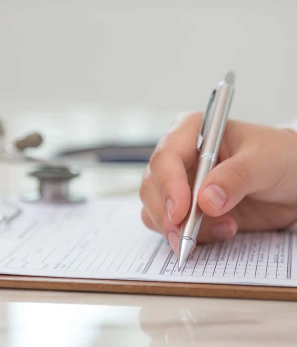 twilight prescription drug person writing paper pen