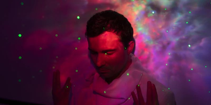 twilight drug detox man white shirt tie standing front