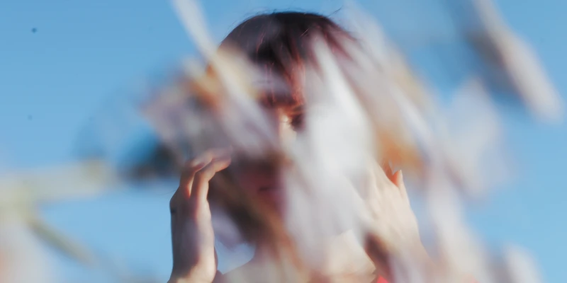 twilight marijuana woman bikini top blowing hair