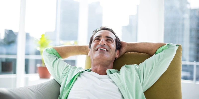 twilight-marijuana-man-relaxing-couch-living-room-blog